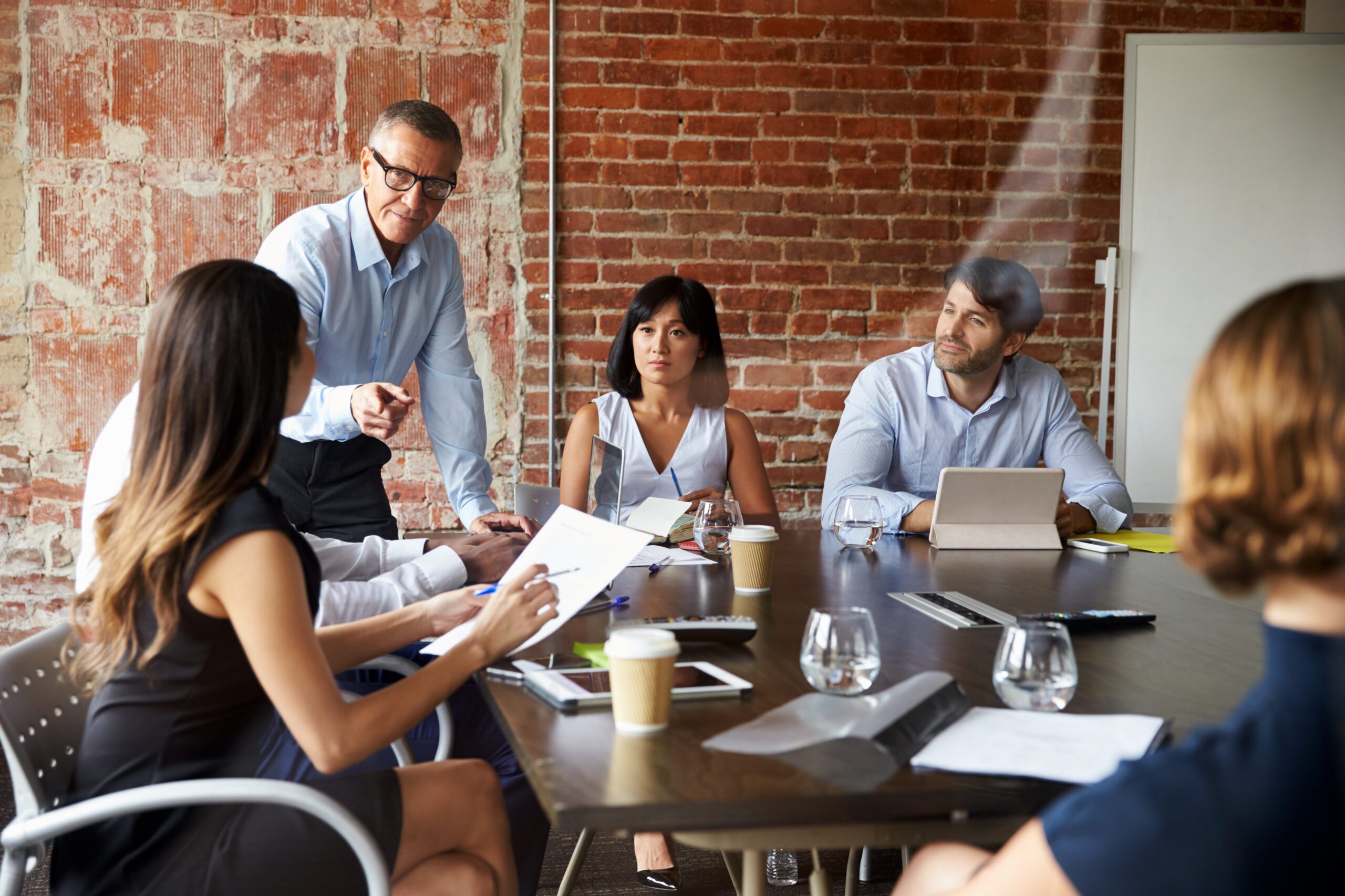 Team discussion on family office solutions and offshore financial planning